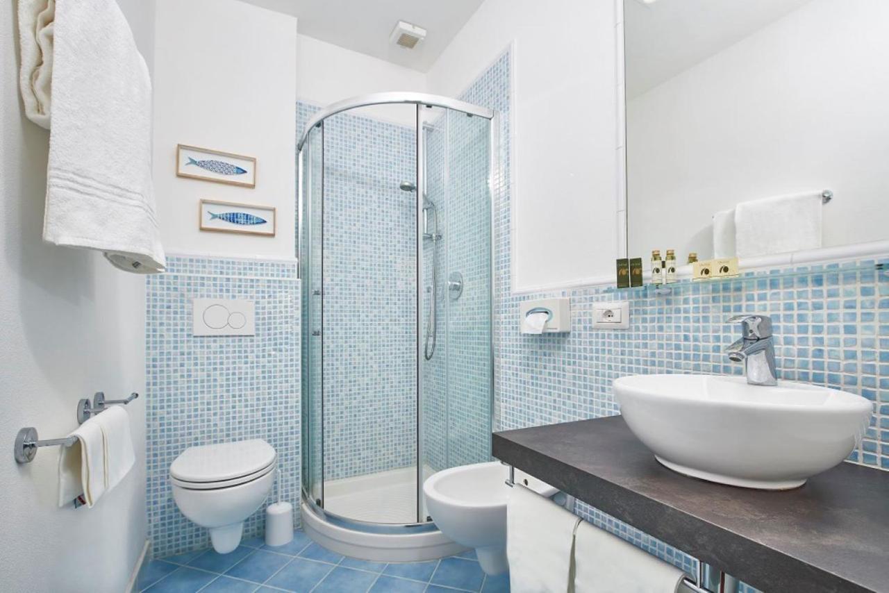 Hotel Antares กาโปลิเวรี ภายนอก รูปภาพ